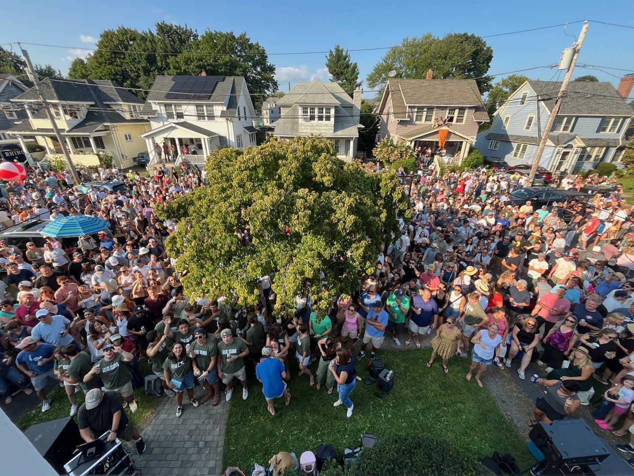 A birds-eye view of the crowd watching Ellis Island